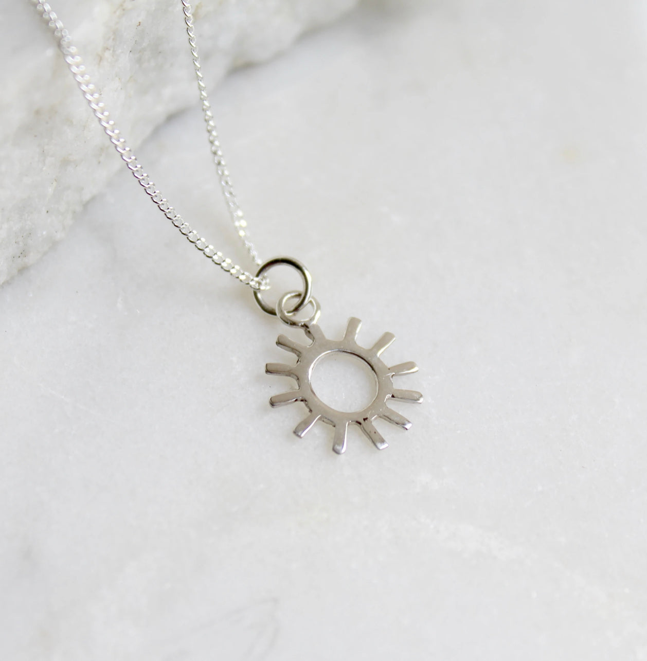 Sun charm pendant necklace