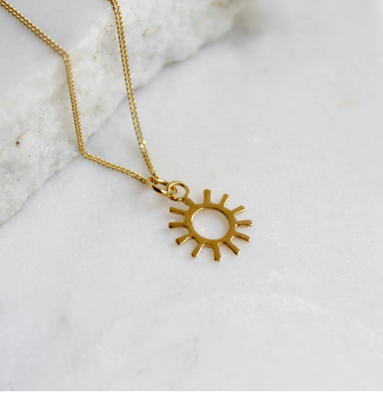 Sun charm pendant necklace