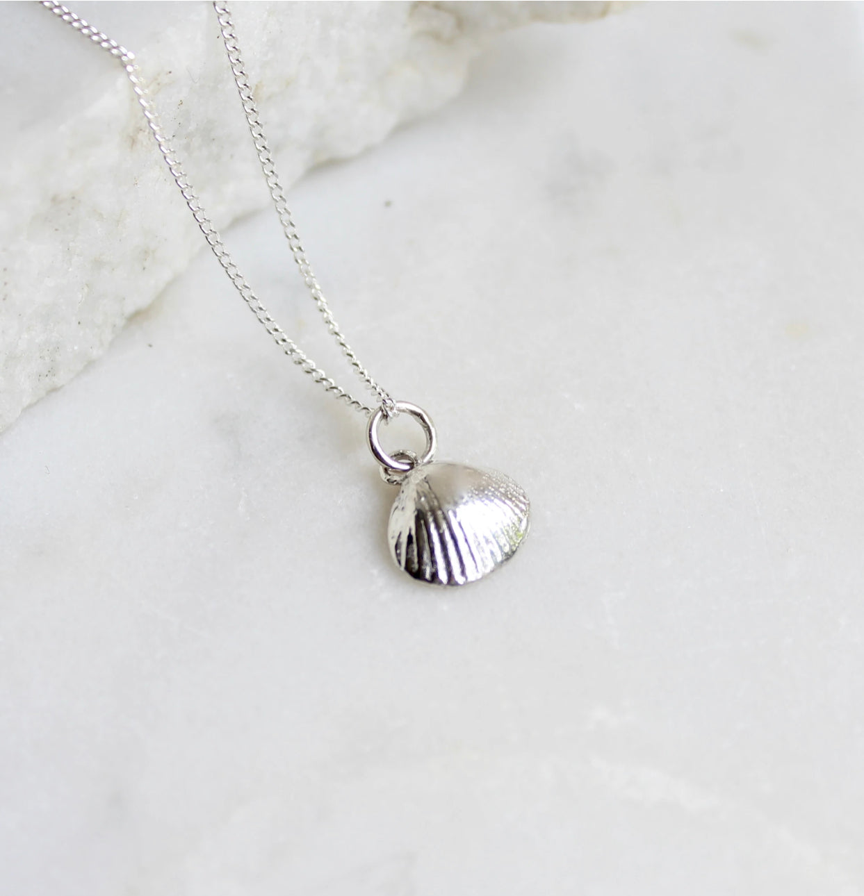 Small shell charm pendant